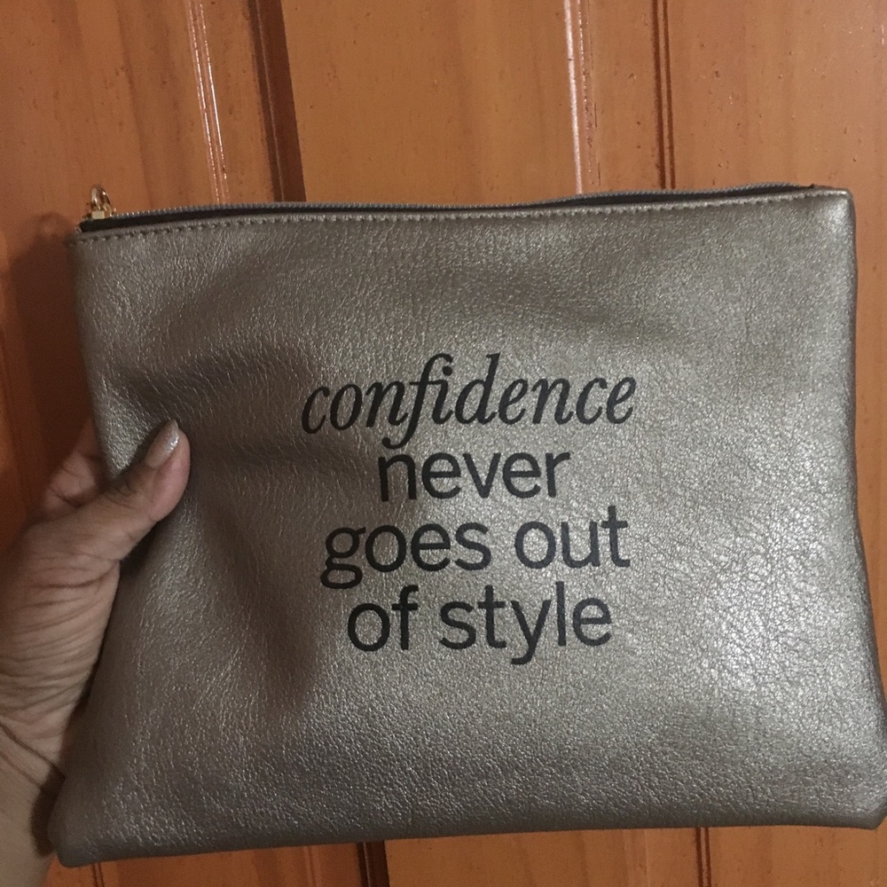Adorable gold clutch/makeup bag